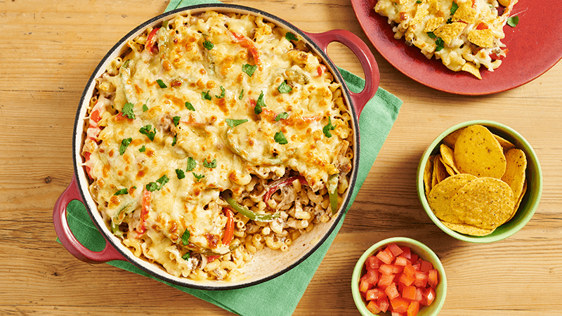 Beefy Fajita Mac and Cheese served in a pot with nachips