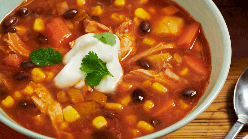 Chilli Turkey, Sweetcorn and Black Bean Soup served in a white bowl